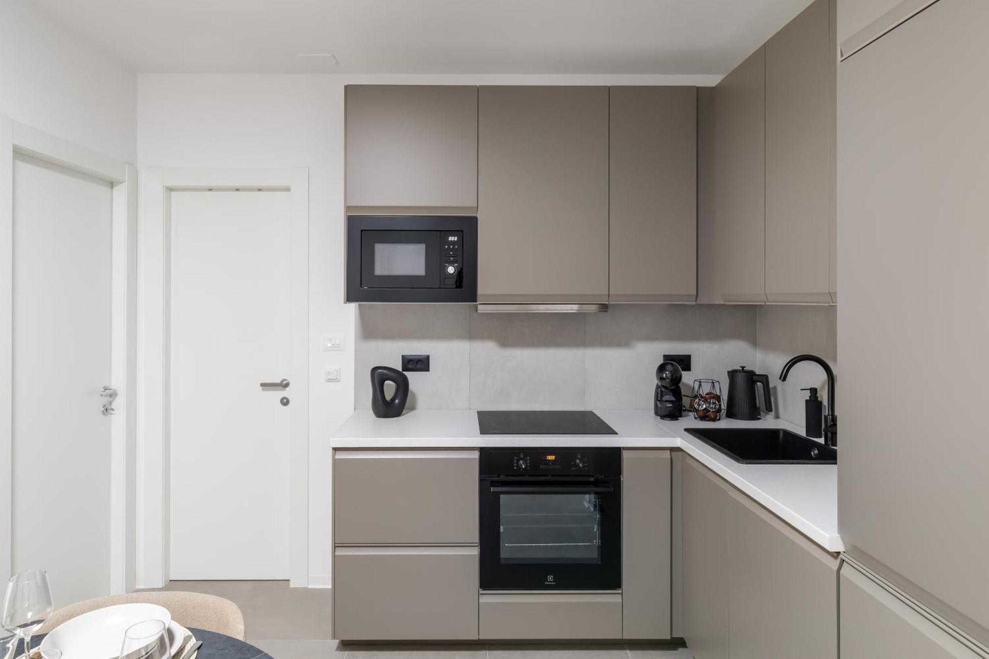 Boutique Soft Tones With Balcony And Secured Garage *